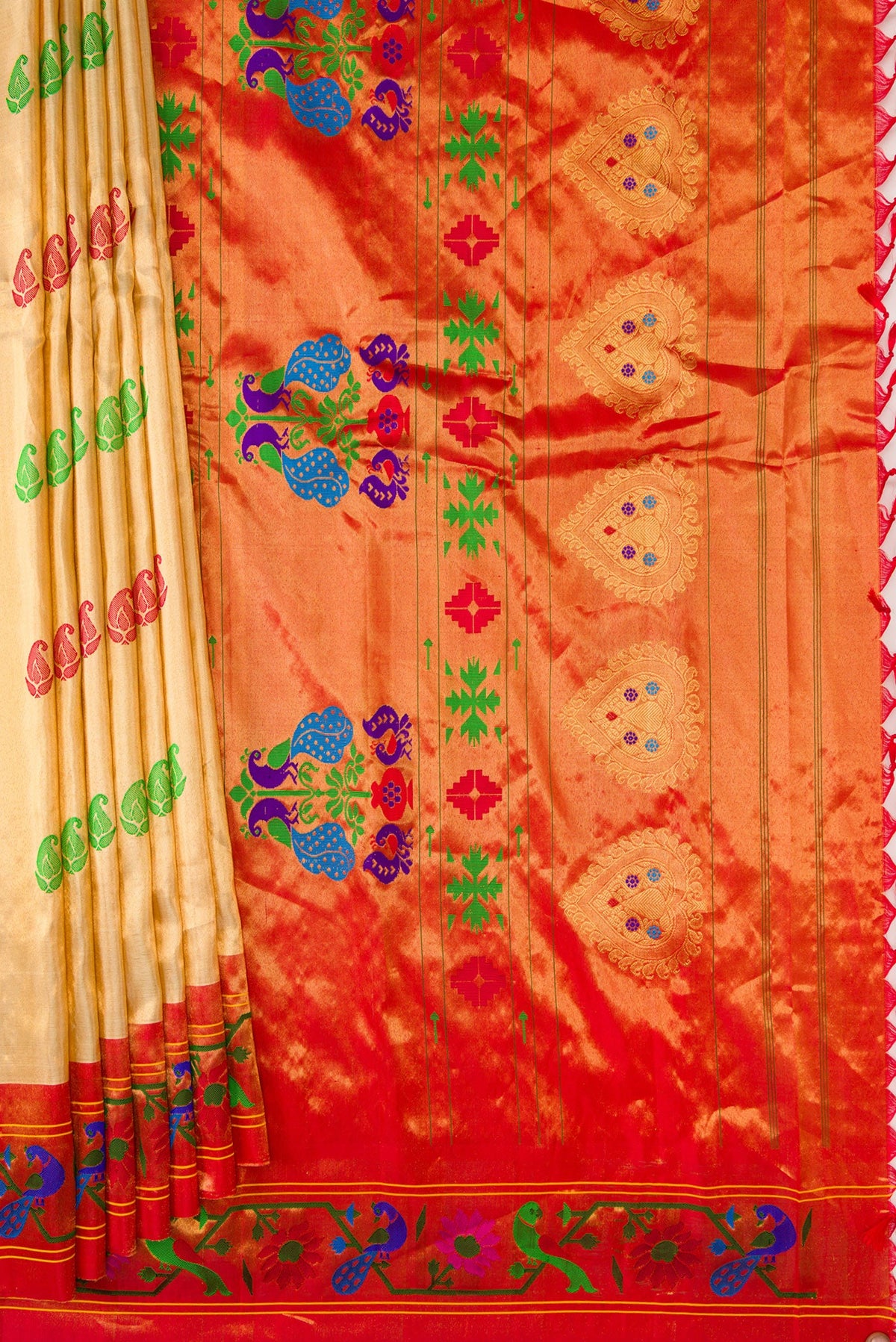 Pleats and pallu of Gold Dual Tone Gadwal Silk Saree with Zari And Thread Butta on the body and Zari And Thread Border. 