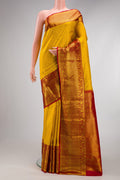 Yellow Dual Tone Kanchipuram Silk Saree with Zari Brocade on the body and Zari Border.  displayed on a mannequin