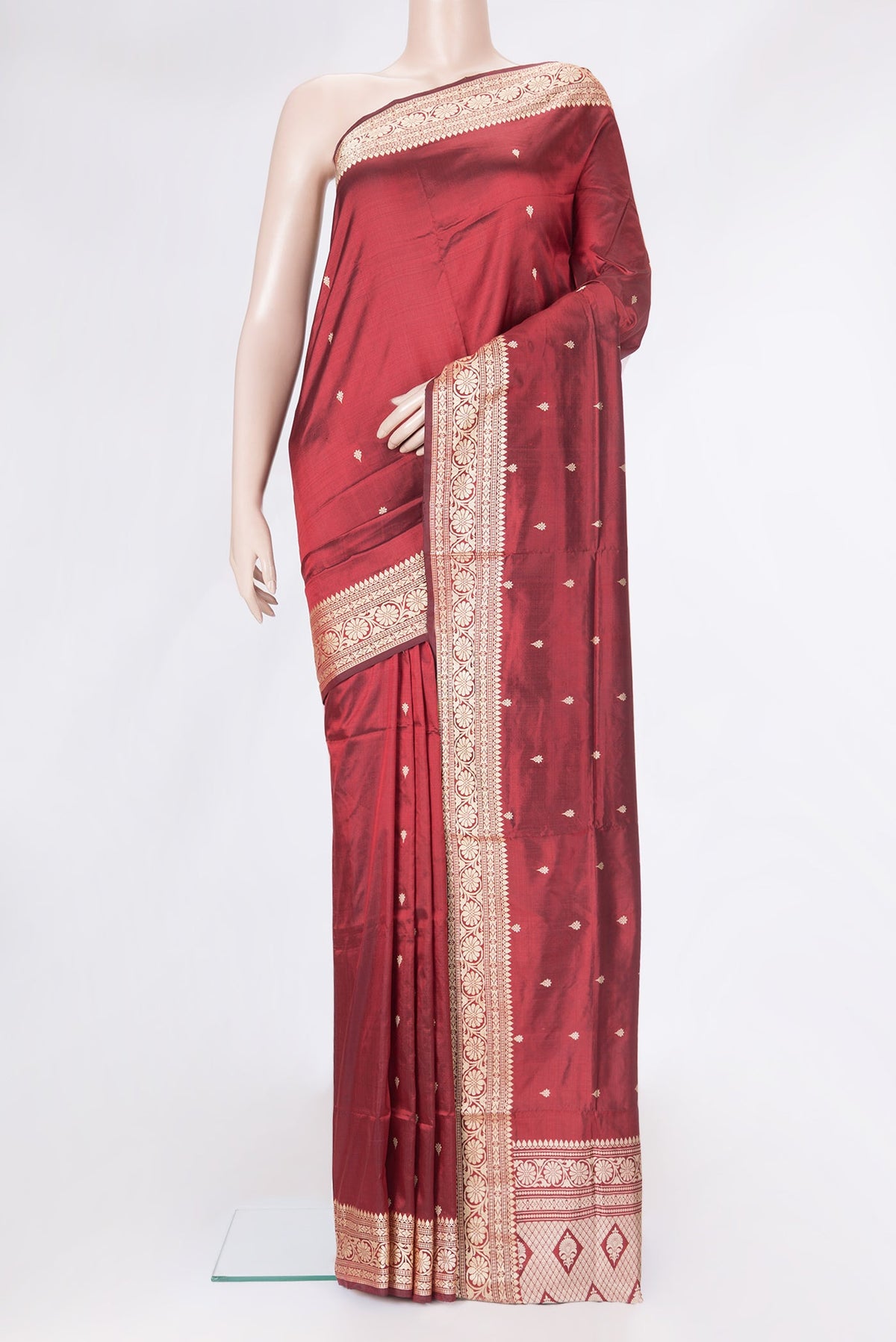 Maroon Dual Tone Banarasi Silk Saree with Thread Butta on the body and Thread Border.  displayed on a mannequin