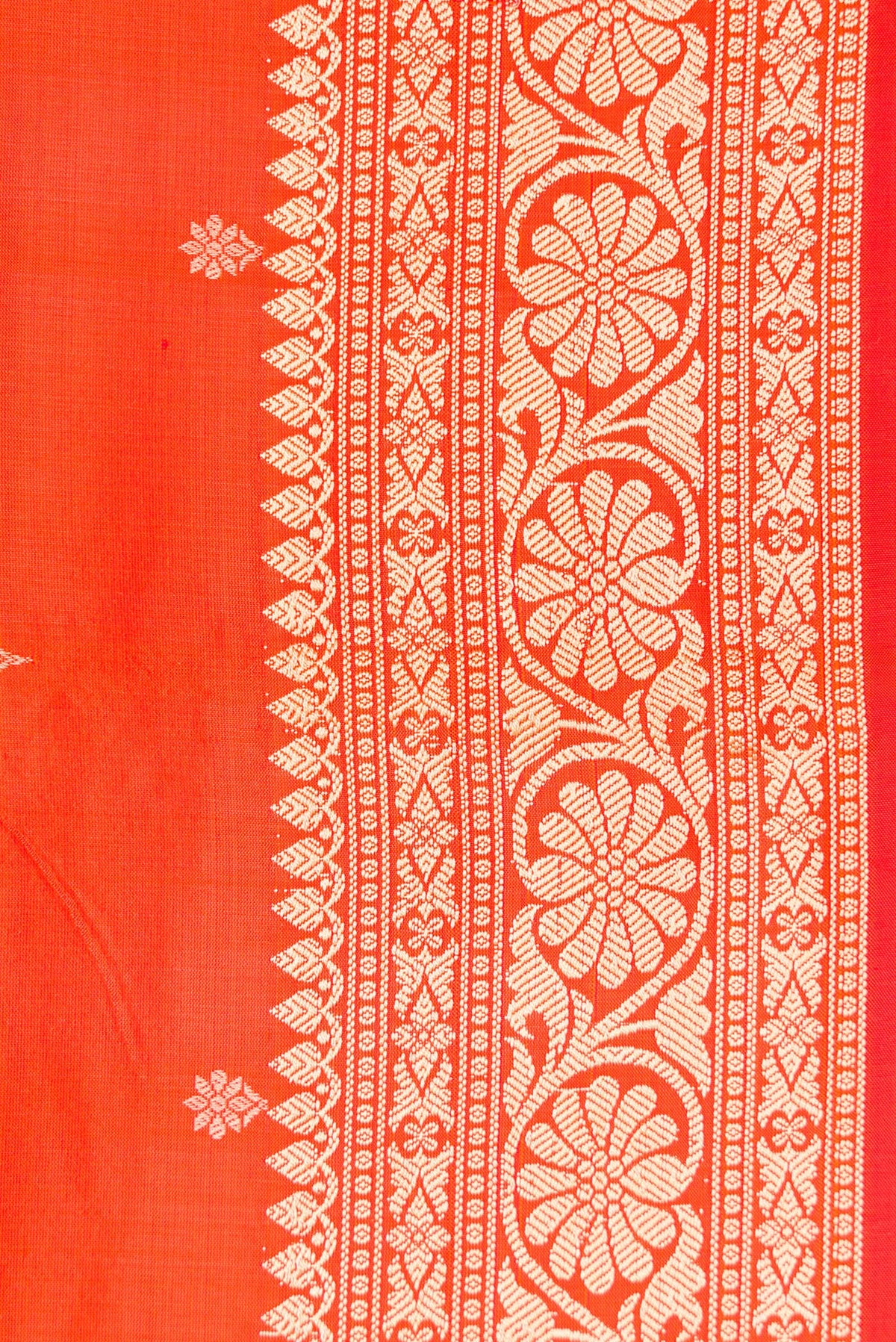 Border image of Orange Dual Tone Banarasi Silk Saree with Thread Butta on the body and Thread Border. 