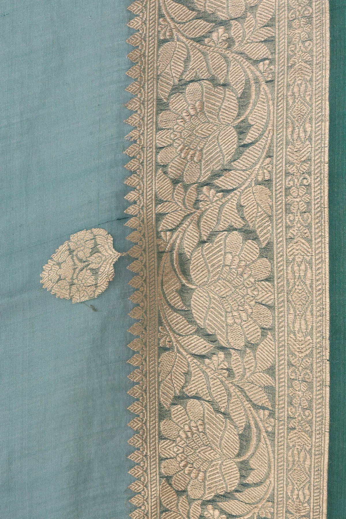 Border image of Peacock Blue Dual Tone Organza Silk Saree with Zari Butta on the body and Zari Border. 