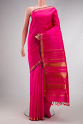 Pure Silk Pure Zari Pink Dual Tone Kanchipuram Saree with Zari Butta on the body and Zari Border.  displayed on a mannequin