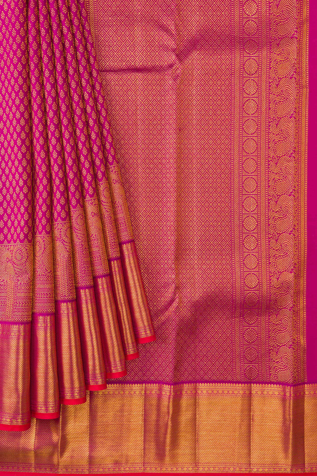 Pleats and pallu of Magenta Kanjivaram Silk Saree with Zari Brocade on the body and Zari Border. 