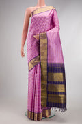 Lavender Kanchipuram Silk Saree with Stripes on the body and Zari Border.  displayed on a mannequin
