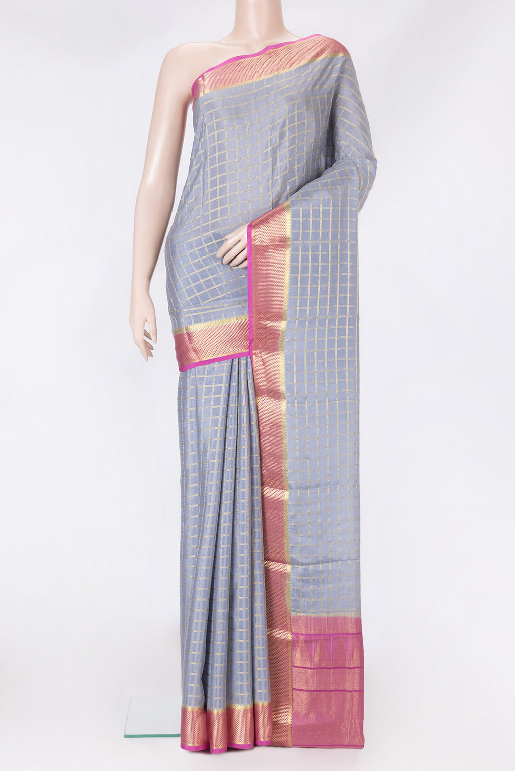 Grey Dual Tone Mysore Silk Saree with Checked design on the body and Zari Border.  displayed on a mannequin