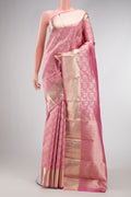 Rose pink Kanchipuram Silk Saree with Zari Brocade on the body and Zari Border.  displayed on a mannequin