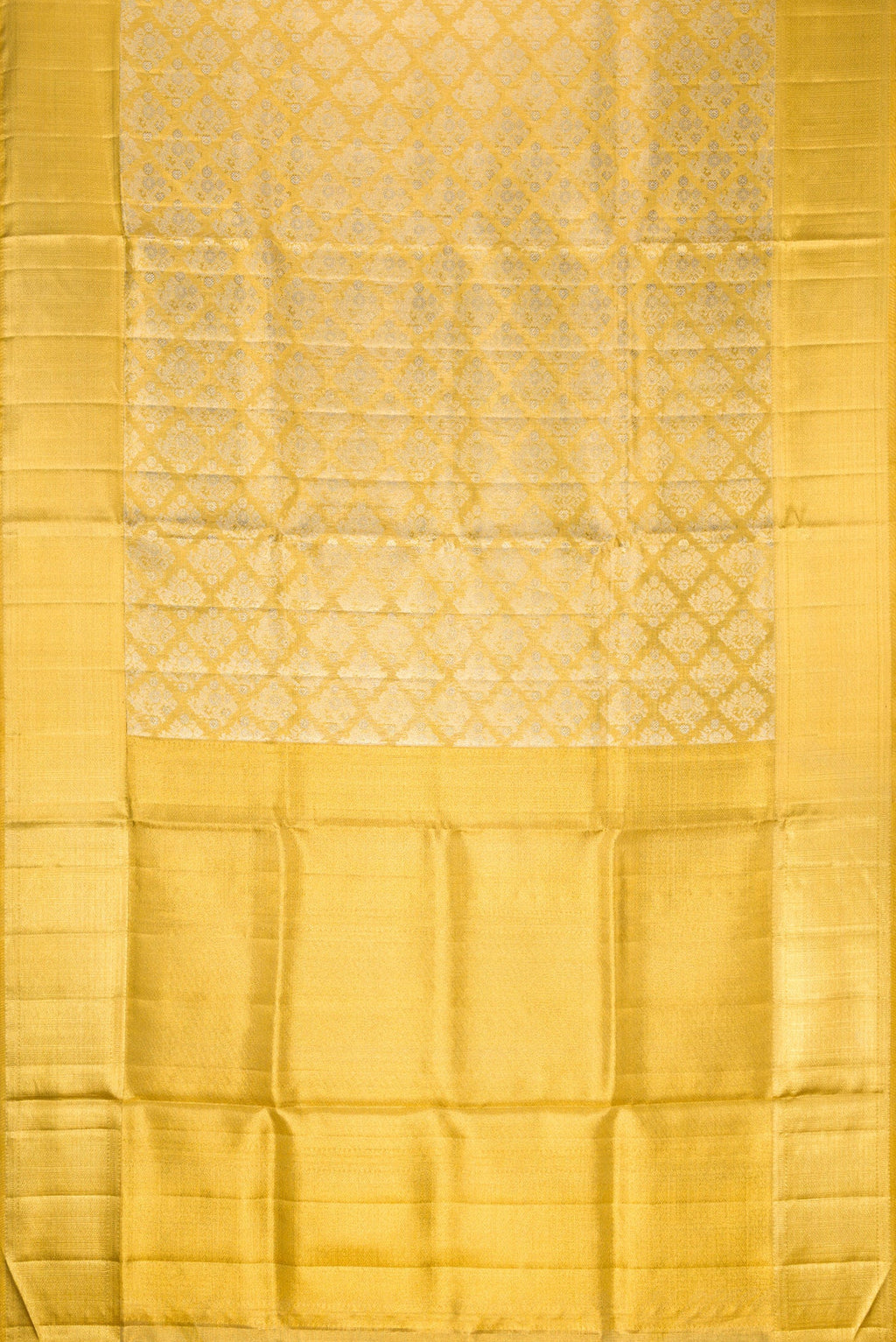 Flat view of Gold Dual Tone Kanjivaram Tissue Silk Saree with Zari Brocade on the body and Zari Border. 