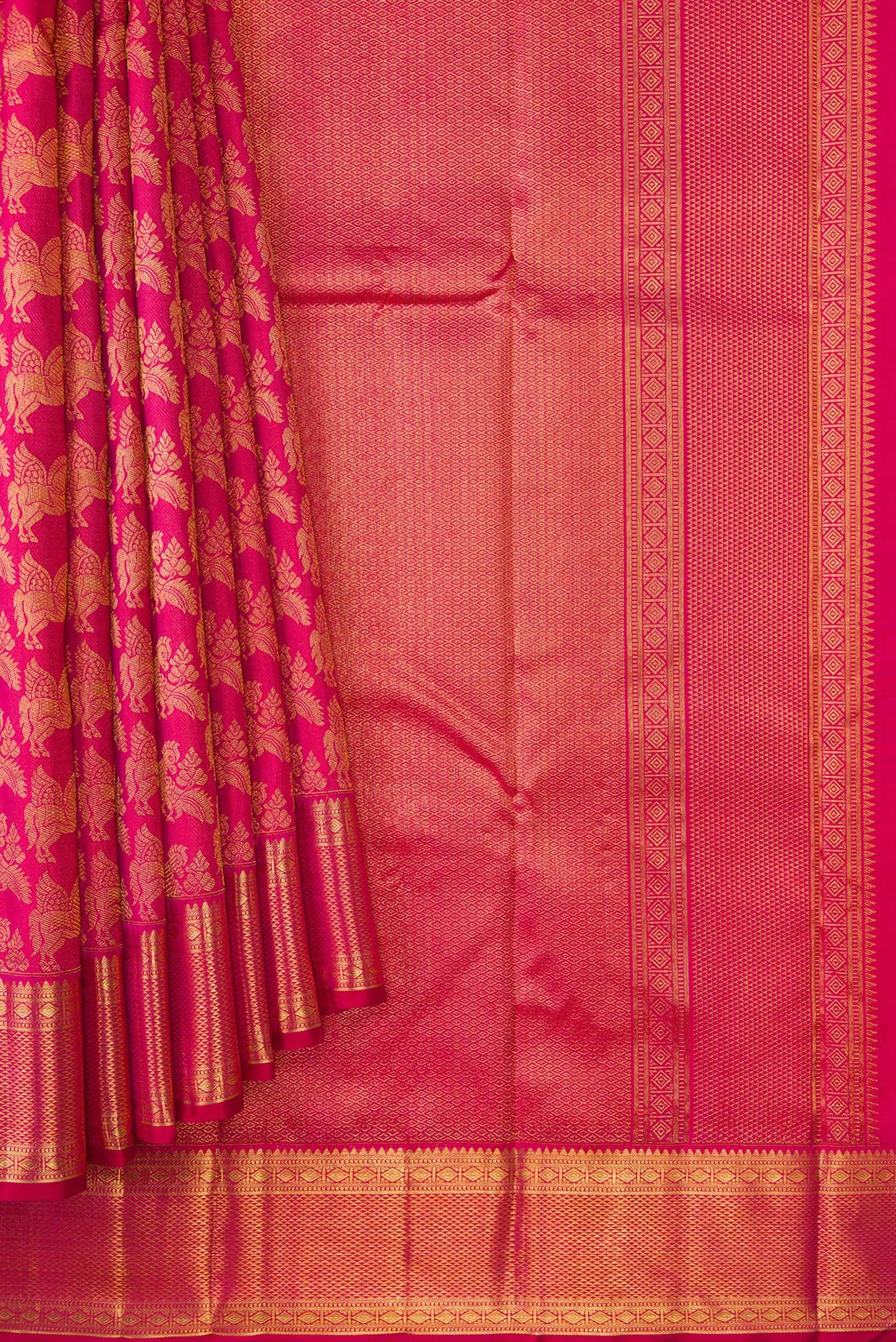 Pleats and pallu of Pink Kanchipuram Silk Saree with Zari Brocade on the body and Zari Border. 