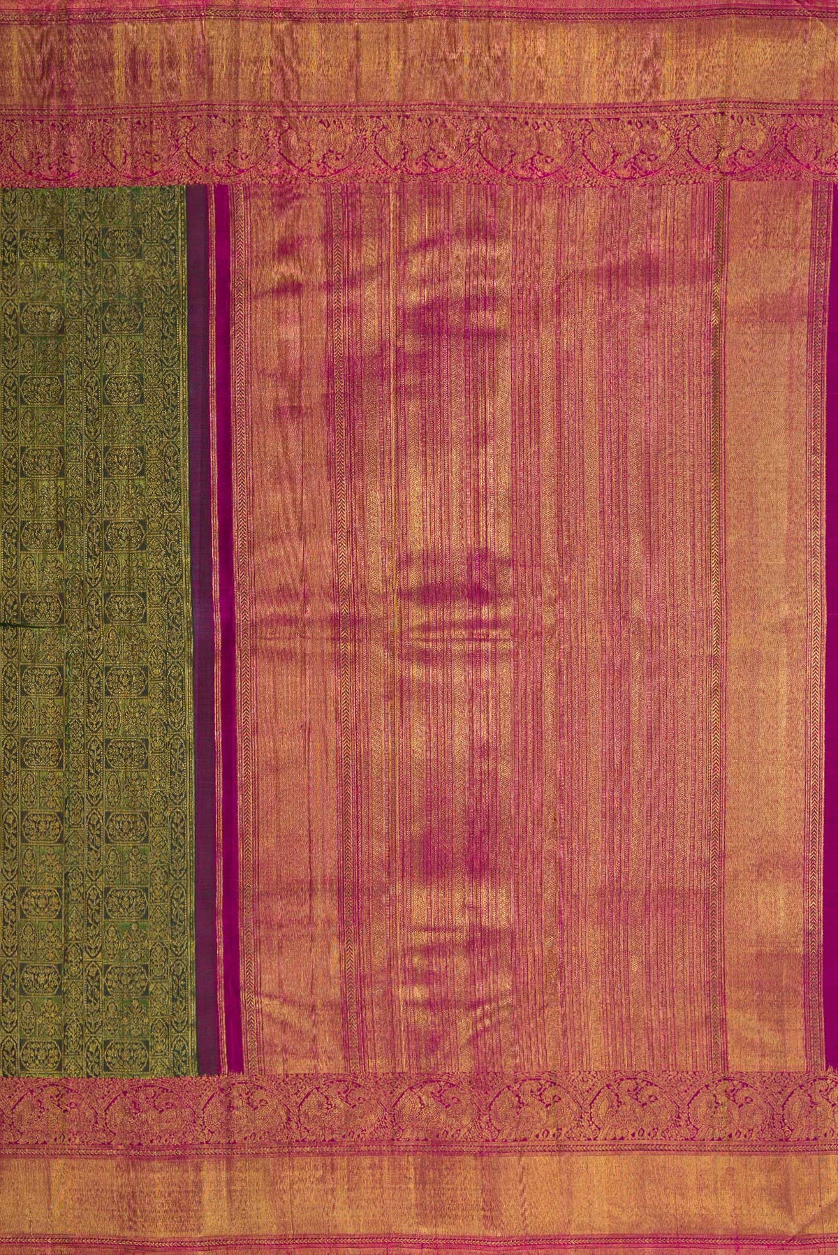 Close up image of the pallu of Green Dual Tone Kanchipuram Silk Saree with Zari Brocade on the body and Zari Border. 