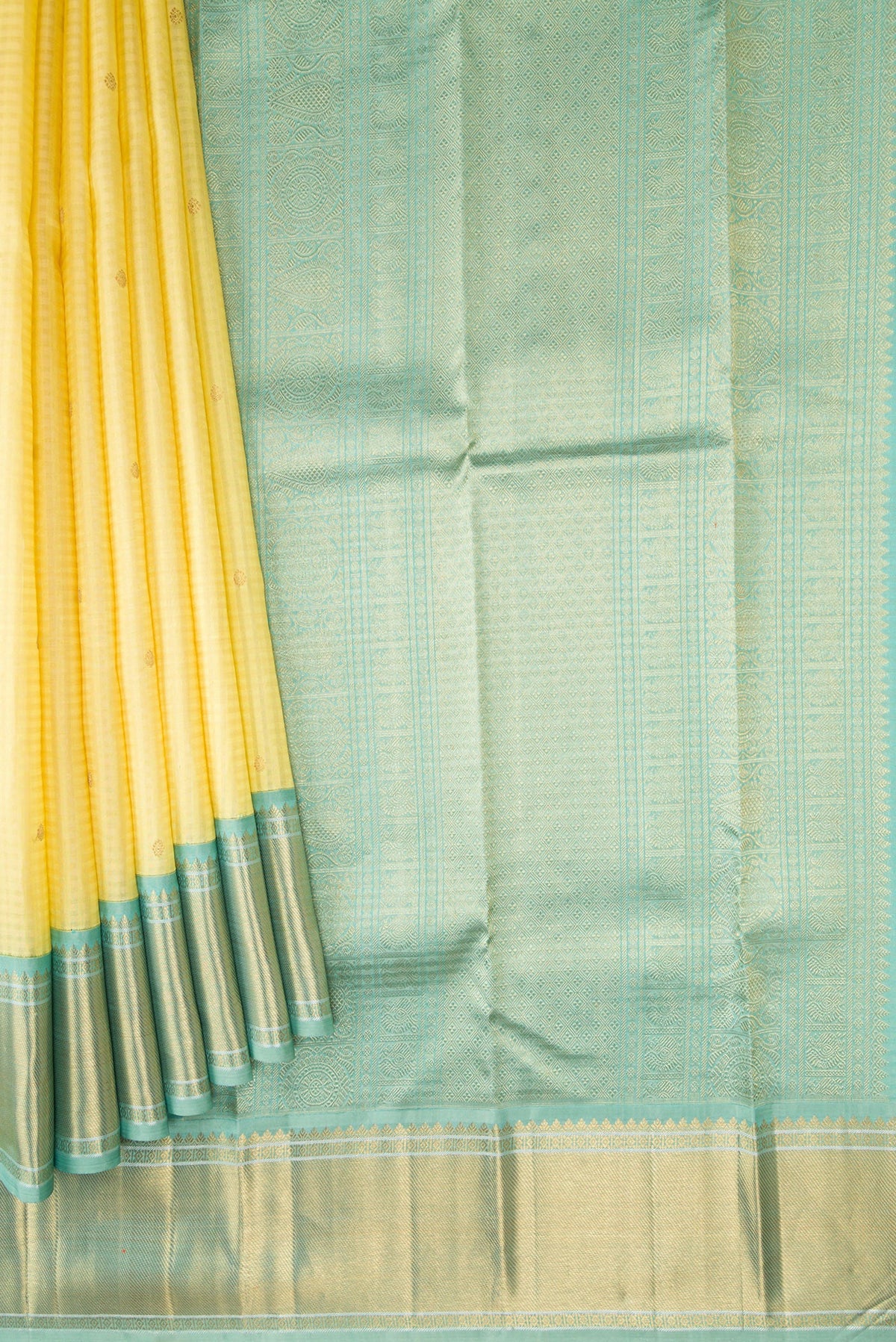 Pleats and pallu of Pure Silk Pure Zari Sandal Dual Tone Kanjivaram Saree with Checked design on the body and Zari Border. 