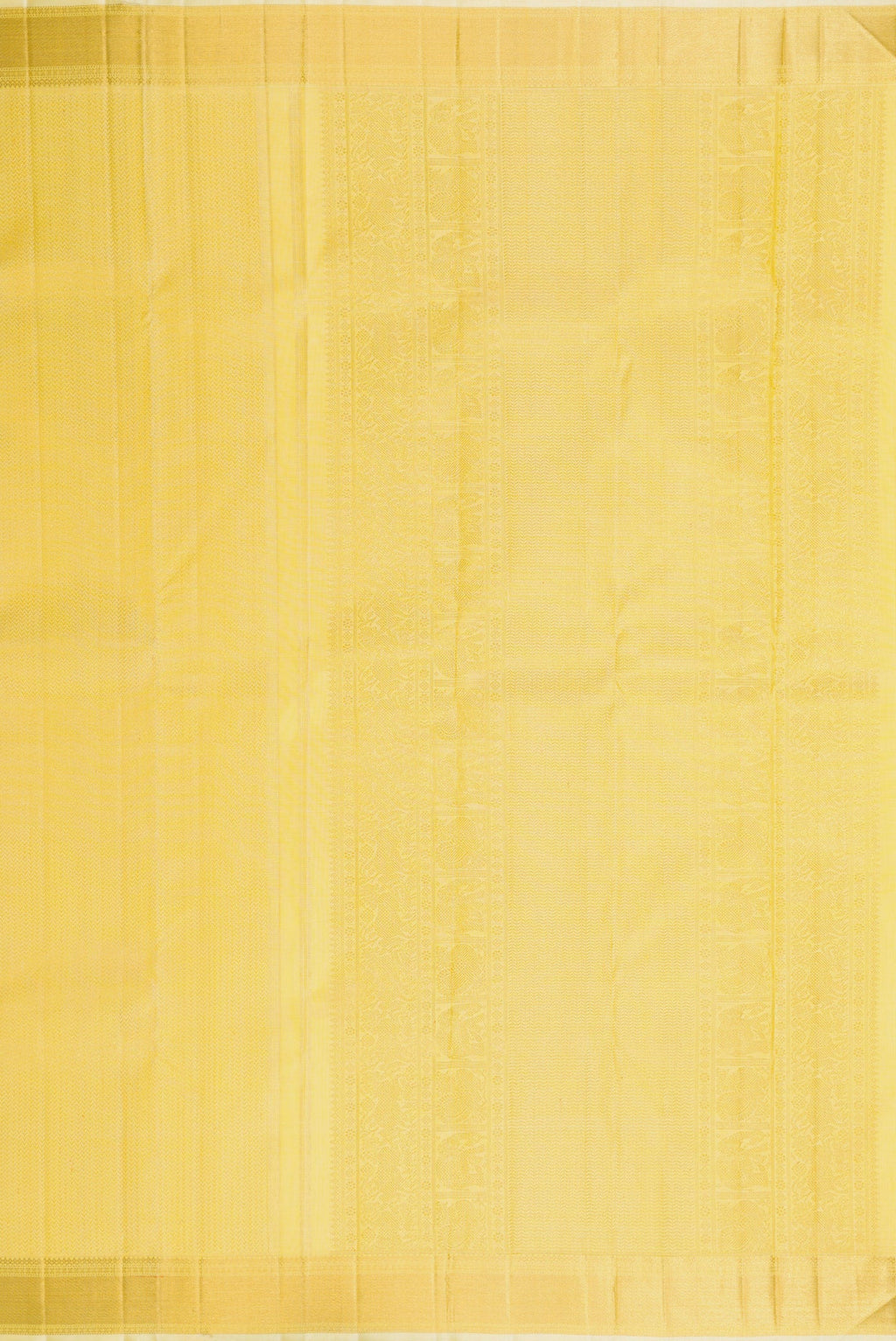 Close up image of the pallu of Lemon Yellow Dual Tone Kanjivaram Silk Saree with Zari Brocade on the body and Zari Border. 