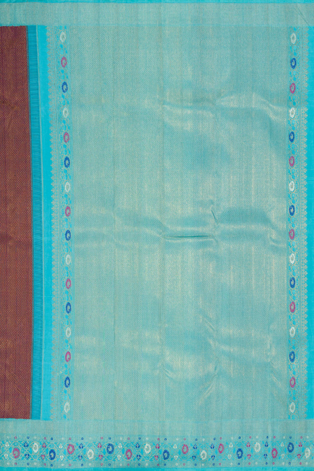 Close up image of the pallu of Burgundy Dual Tone Kanjivaram Silk Saree with Zari Brocade on the body and Fancy Border. 