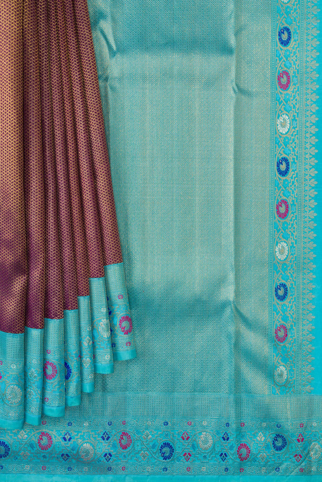 Pleats and pallu of Burgundy Dual Tone Kanjivaram Silk Saree with Zari Brocade on the body and Fancy Border. 