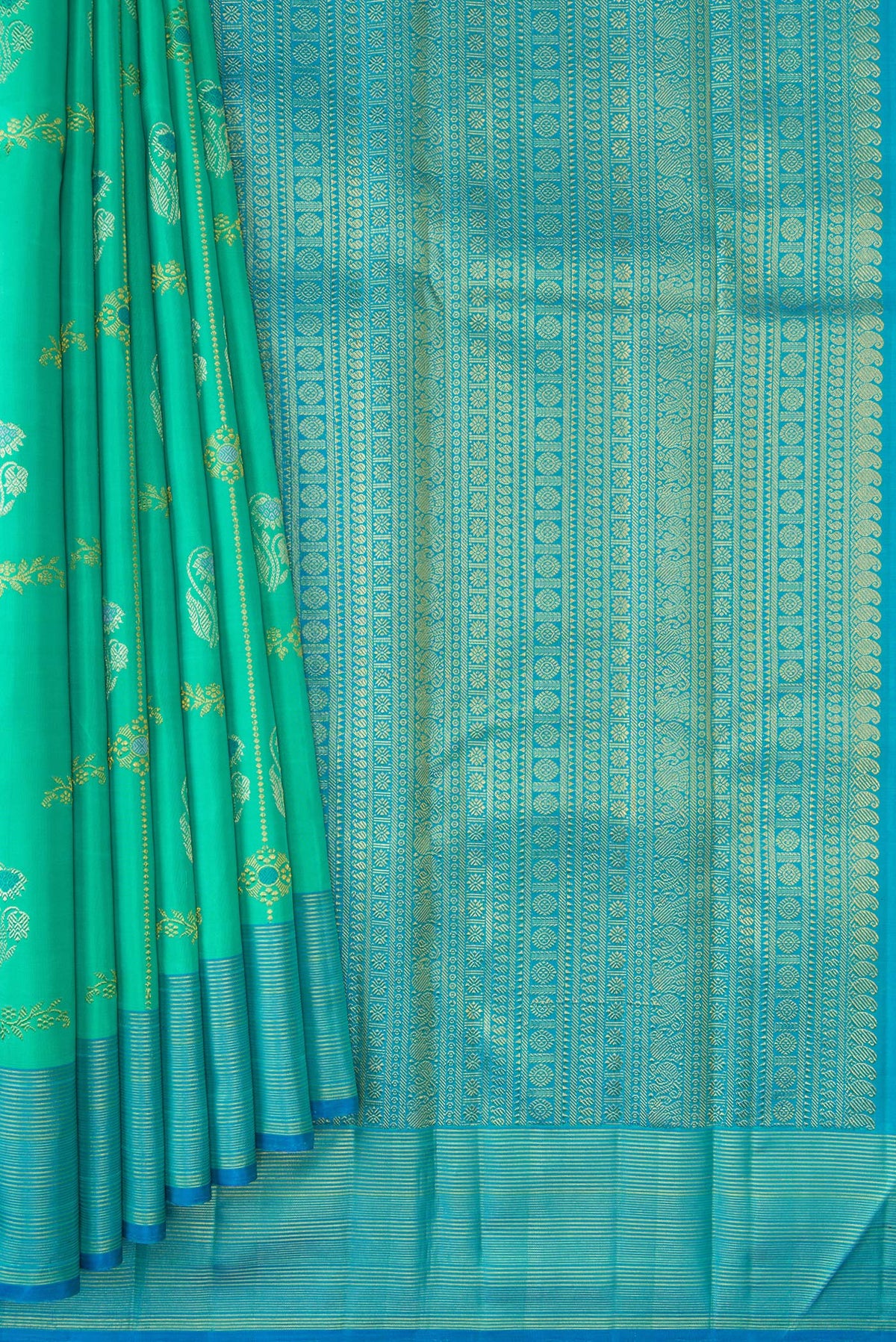 Pleats and pallu of Pure Silk Pure Zari Sea Green Dual Tone Kanjivaram Saree with Zari Butta on the body and Zari Border. 