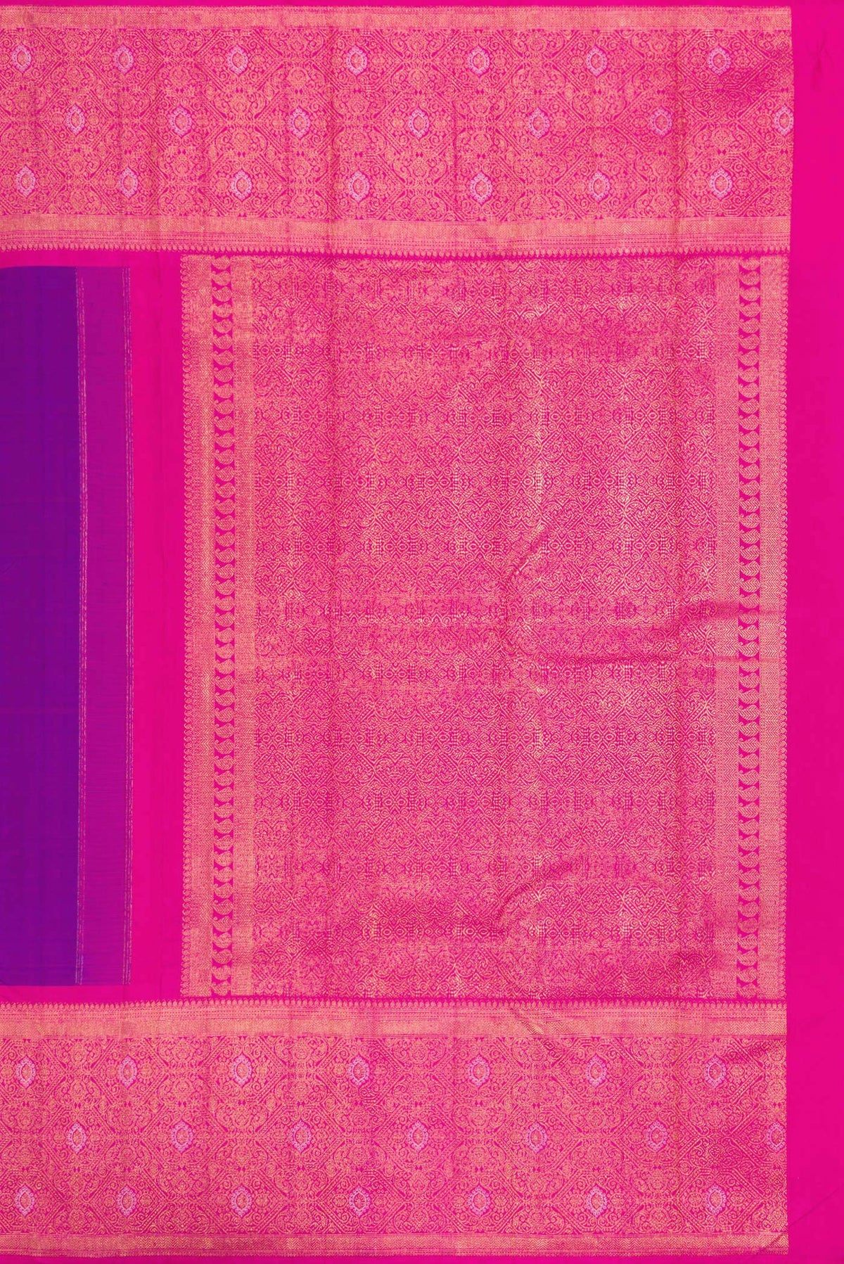 Close up image of the pallu of Pure Silk Pure Zari Purple Dual Tone Kanjivaram Saree with Zari Butta on the body and Fancy Border. 