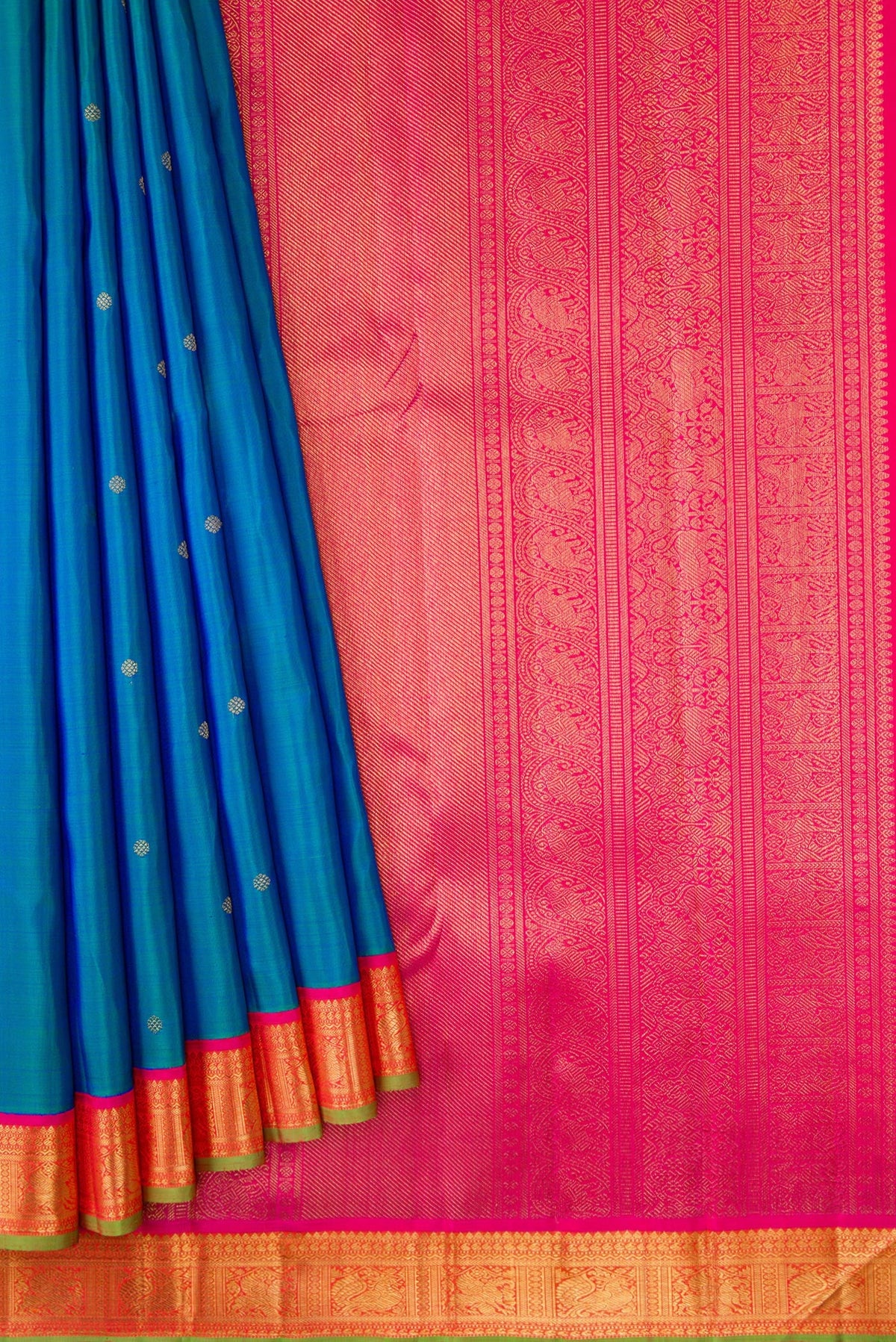 Pleats and pallu of Pure Silk Pure Zari Peacock Blue Dual Tone Kanjivaram Saree with Zari Butta on the body and Zari Border. 