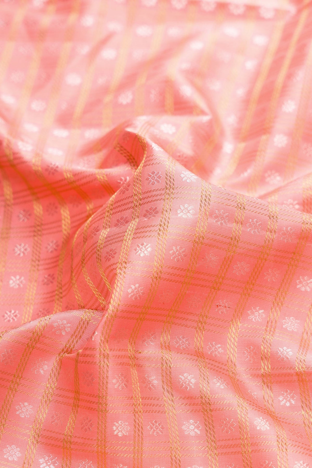 Close up of Pure Silk Pure Zari Pink Dual Tone Kanjivaram Saree with Zari Brocade on the body and Zari Border.  displaying folds