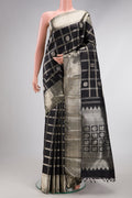 Beige and Off White Dual Tone Kanchipuram Silk Saree with Checked design on the body and Zari Border.  displayed on a mannequin