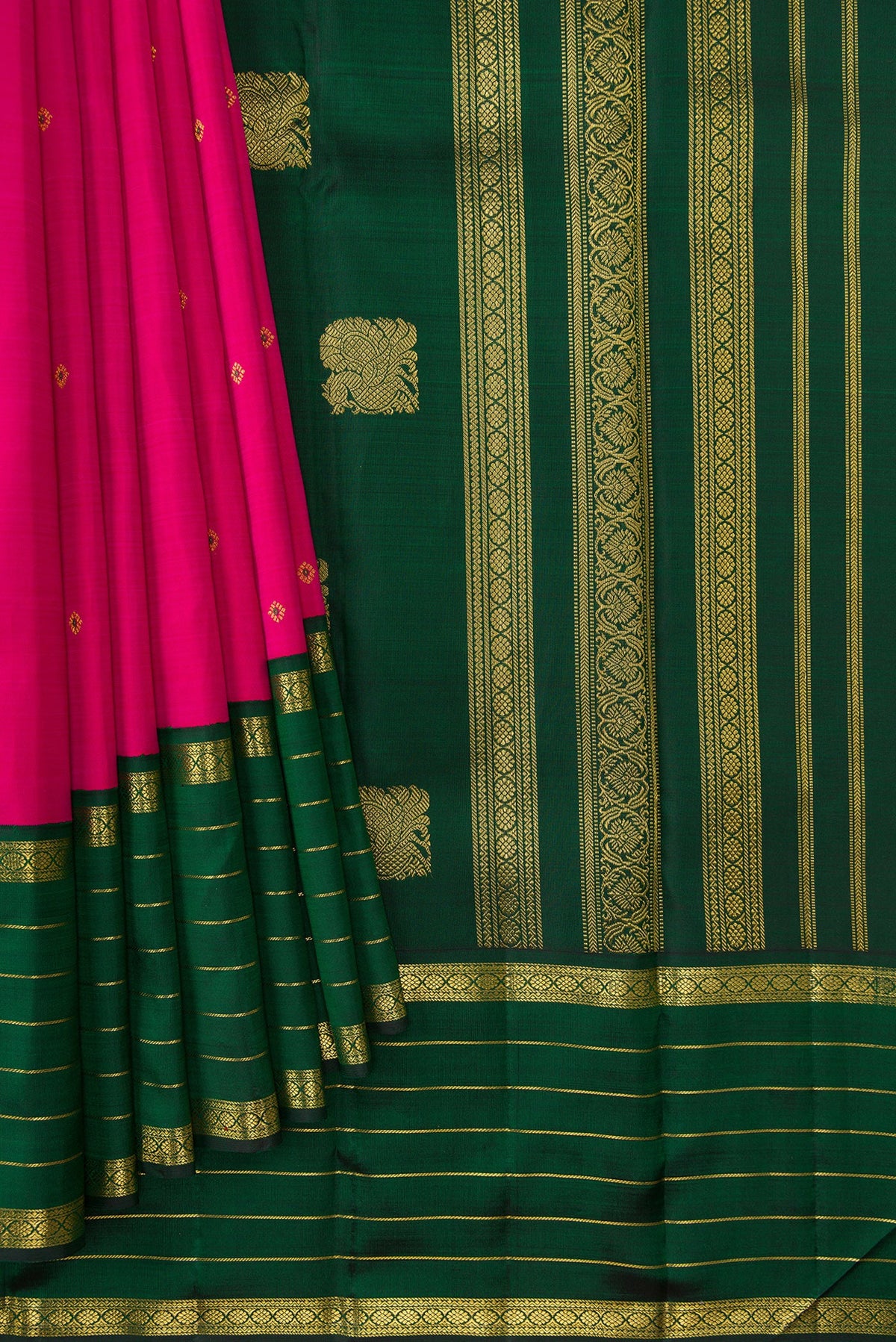 Pleats and pallu of Dark Pink Dual Tone Kanchipuram Silk Saree with Zari Butta on the body and Zari Border. 