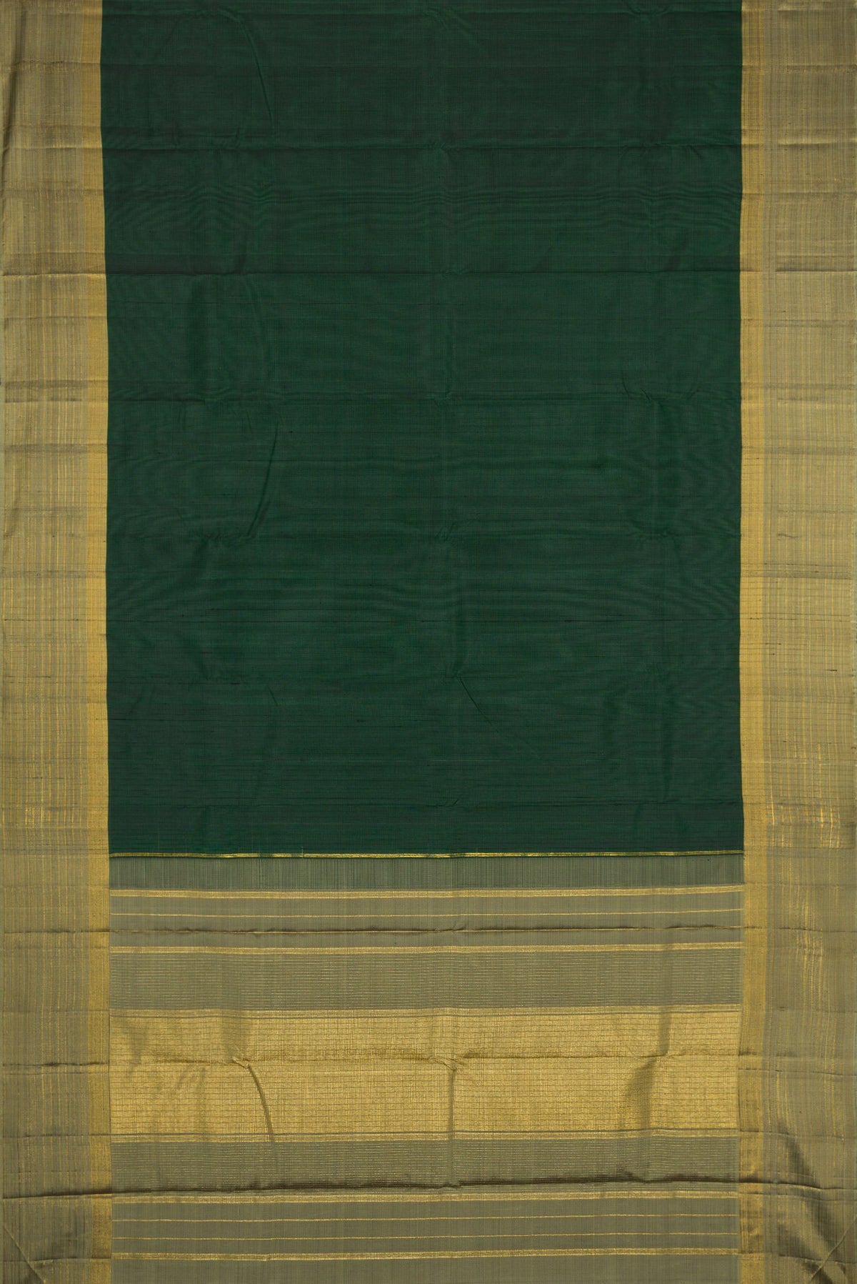 Flat view of Bottle Green Dual Tone Kanjivaram Silk Saree with Plain Body and Zari Border. 