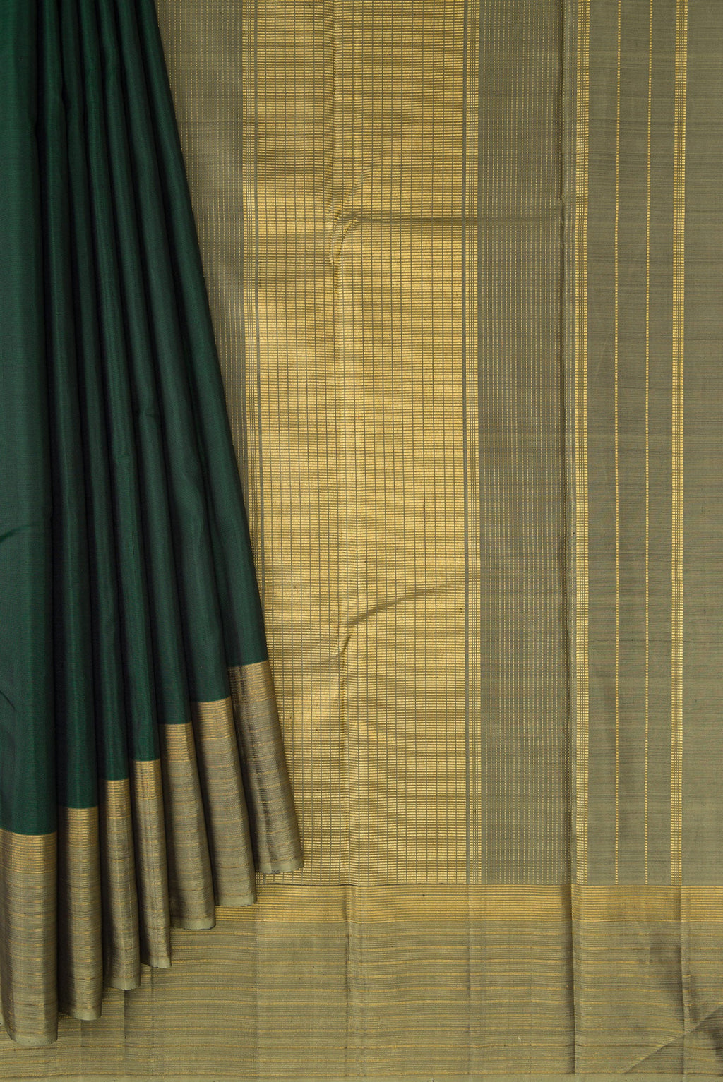 Pleats and pallu of Bottle Green Dual Tone Kanjivaram Silk Saree with Plain Body and Zari Border. 
