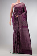 Burgundy Dual Tone Kanjivaram Silk Saree with Zari Brocade on the body and Zari Border.  displayed on a mannequin