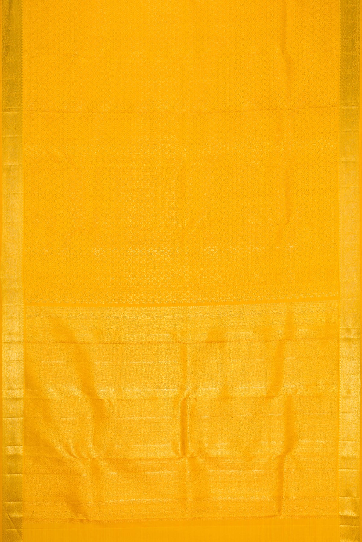 Flat view of Yellow Kanchipuram Silk Saree with Zari Brocade on the body and Zari Border. 