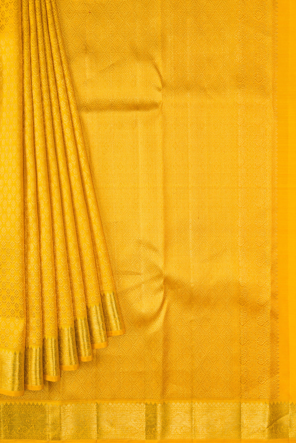 Pleats and pallu of Yellow Kanchipuram Silk Saree with Zari Brocade on the body and Zari Border. 