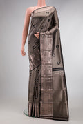 Black Dual Tone Kanchipuram Silk Saree with Zari Brocade on the body and Zari Border.  displayed on a mannequin