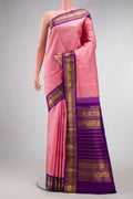 Pink Dual Tone Kanchipuram Silk Saree with Zari Butta on the body and Zari Border.  displayed on a mannequin