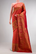 Red Kanjivaram Silk Saree with Zari Brocade on the body and Zari Border.  displayed on a mannequin