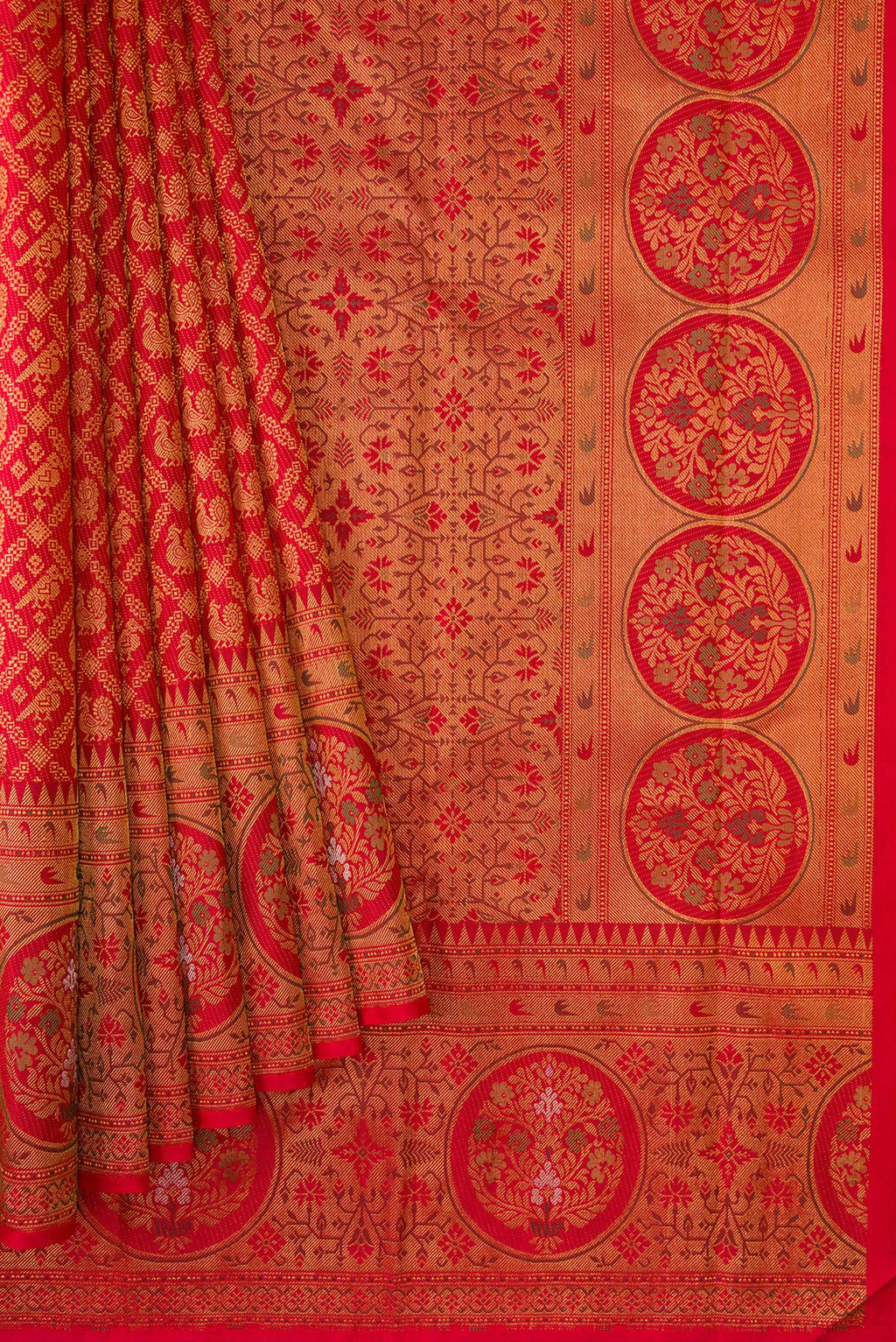 Pleats and pallu of Red Kanjivaram Silk Saree with Zari Brocade on the body and Zari Border. 