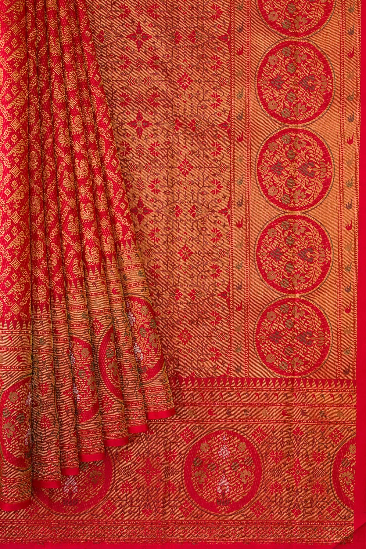 Pleats and pallu of Red Kanjivaram Silk Saree with Zari Brocade on the body and Zari Border. 