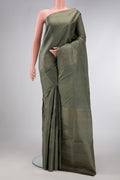 Brown Dual Tone Soft Silk Saree with Zari Butta on the body and Without Border.  displayed on a mannequin