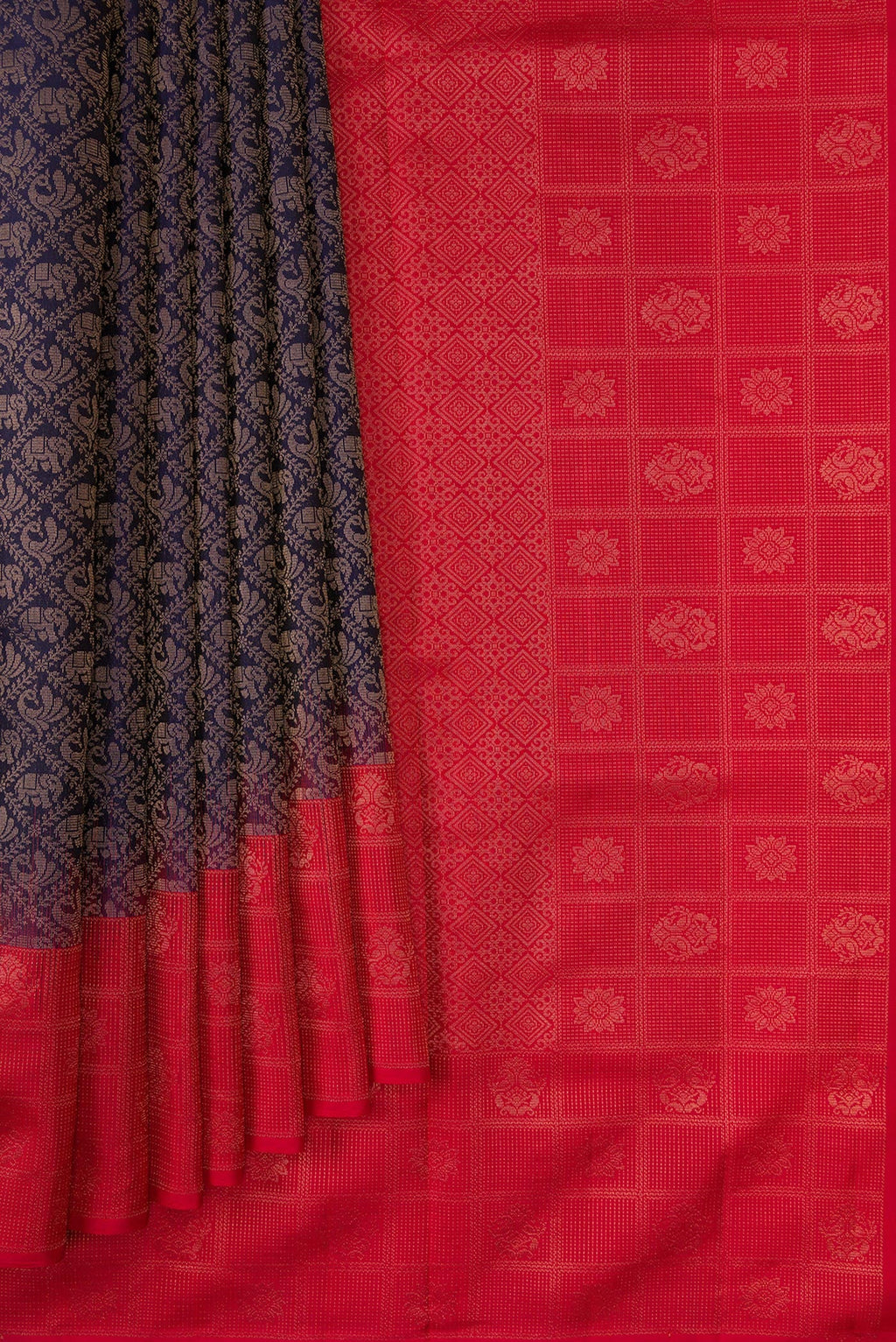 Pleats and pallu of Navy Blue Dual Tone Soft Silk Saree with Zari Brocade on the body and Fancy Border. 