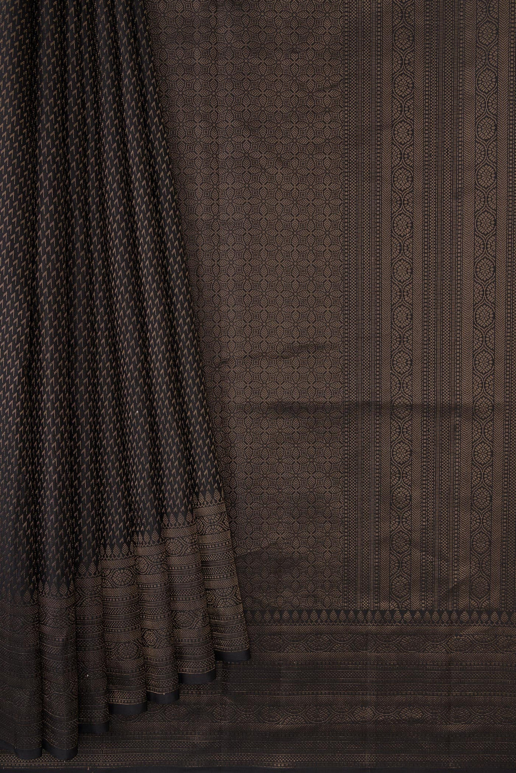 Pleats and pallu of Black Dual Tone Soft Silk Saree with Zari Brocade on the body and Fancy Border. 