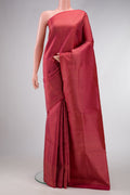 Brick Orange Dual Tone Soft Silk Saree with Zari Brocade on the body and Fancy Border.  displayed on a mannequin