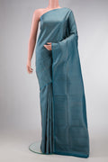 Maya Blue Dual Tone Soft Silk Saree with Zari Brocade on the body and Fancy Border.  displayed on a mannequin