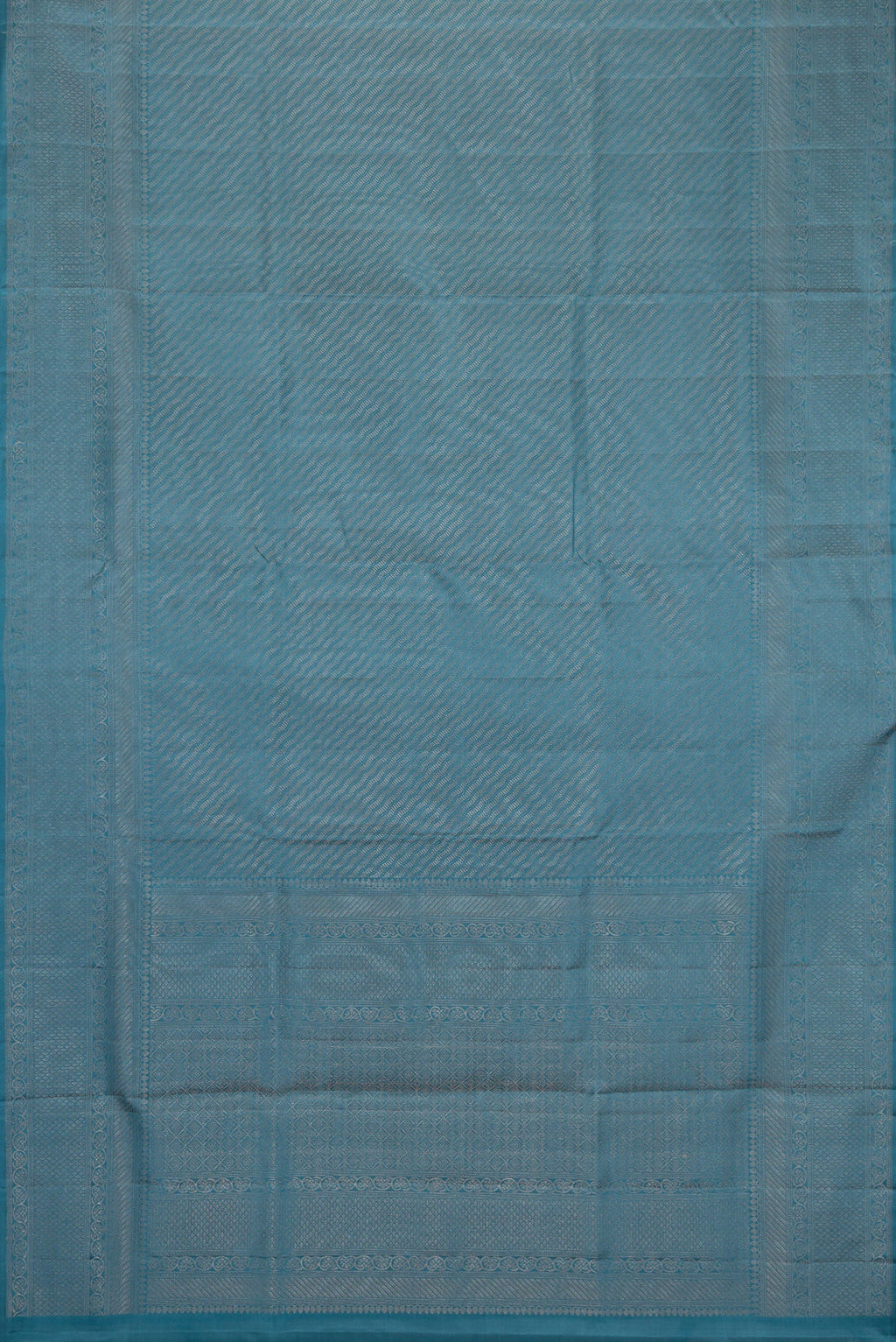 Flat view of Maya Blue Dual Tone Soft Silk Saree with Zari Brocade on the body and Fancy Border. 