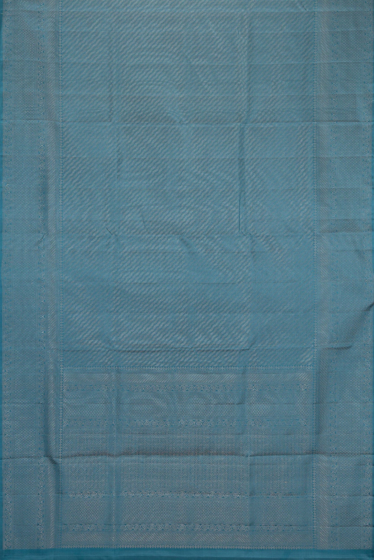 Flat view of Maya Blue Dual Tone Soft Silk Saree with Zari Brocade on the body and Fancy Border. 