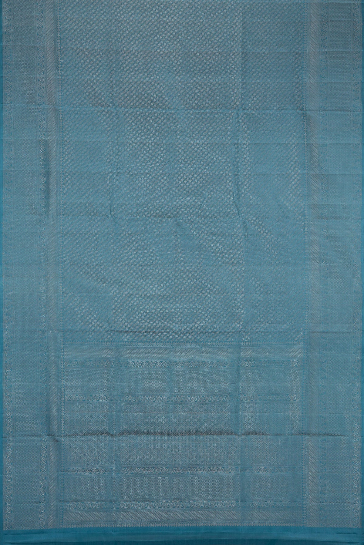 Flat view of Maya Blue Dual Tone Soft Silk Saree with Zari Brocade on the body and Fancy Border. 