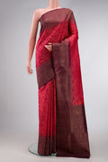 Brick Orange Dual Tone Soft Silk Saree with Zari Brocade on the body and Fancy Border.  displayed on a mannequin