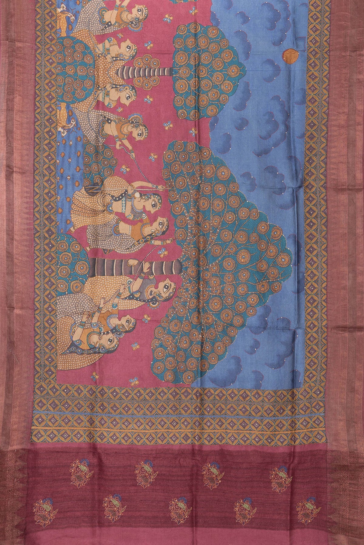 Flat view of Peacock Blue Dual Tone Tussar Silk Saree with Printed design on the body and Embroidery Border. 