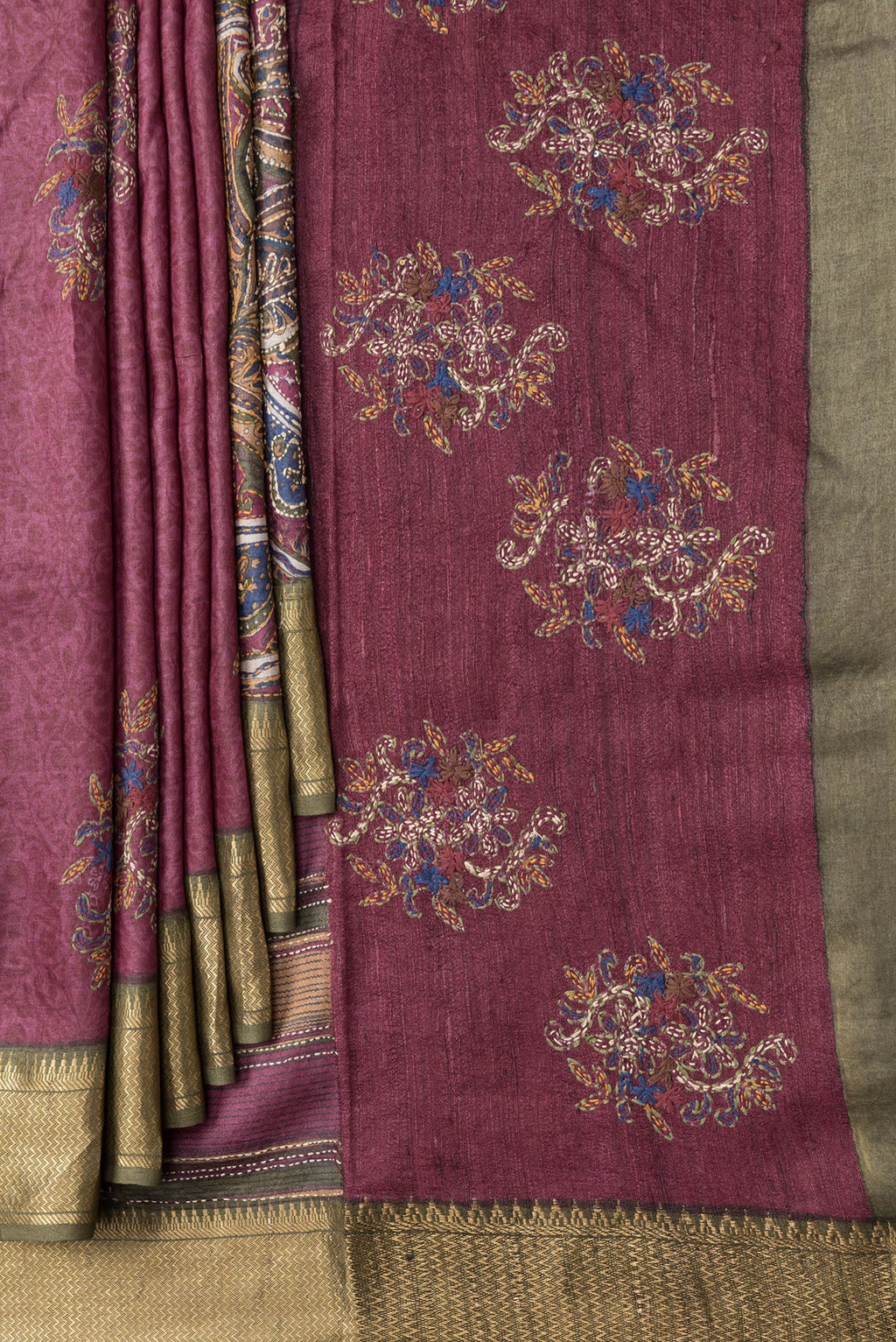 Pleats and pallu of Magenta Dual Tone Tussar Silk Saree with Embroidery on the body and Zari Border. 