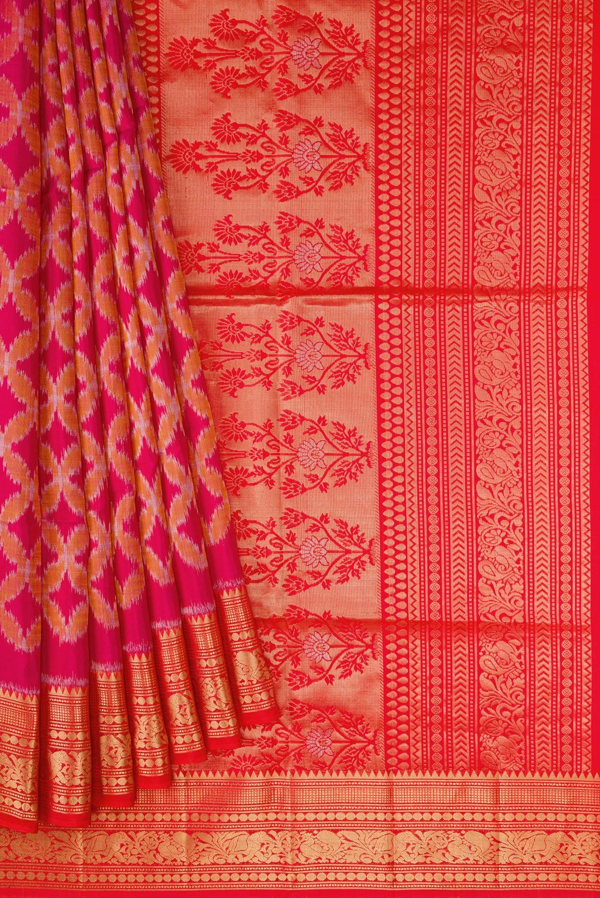 Pleats and pallu of Dark Pink Dual Tone Soft Silk Saree with Ikat Print on the body and Zari Border. 