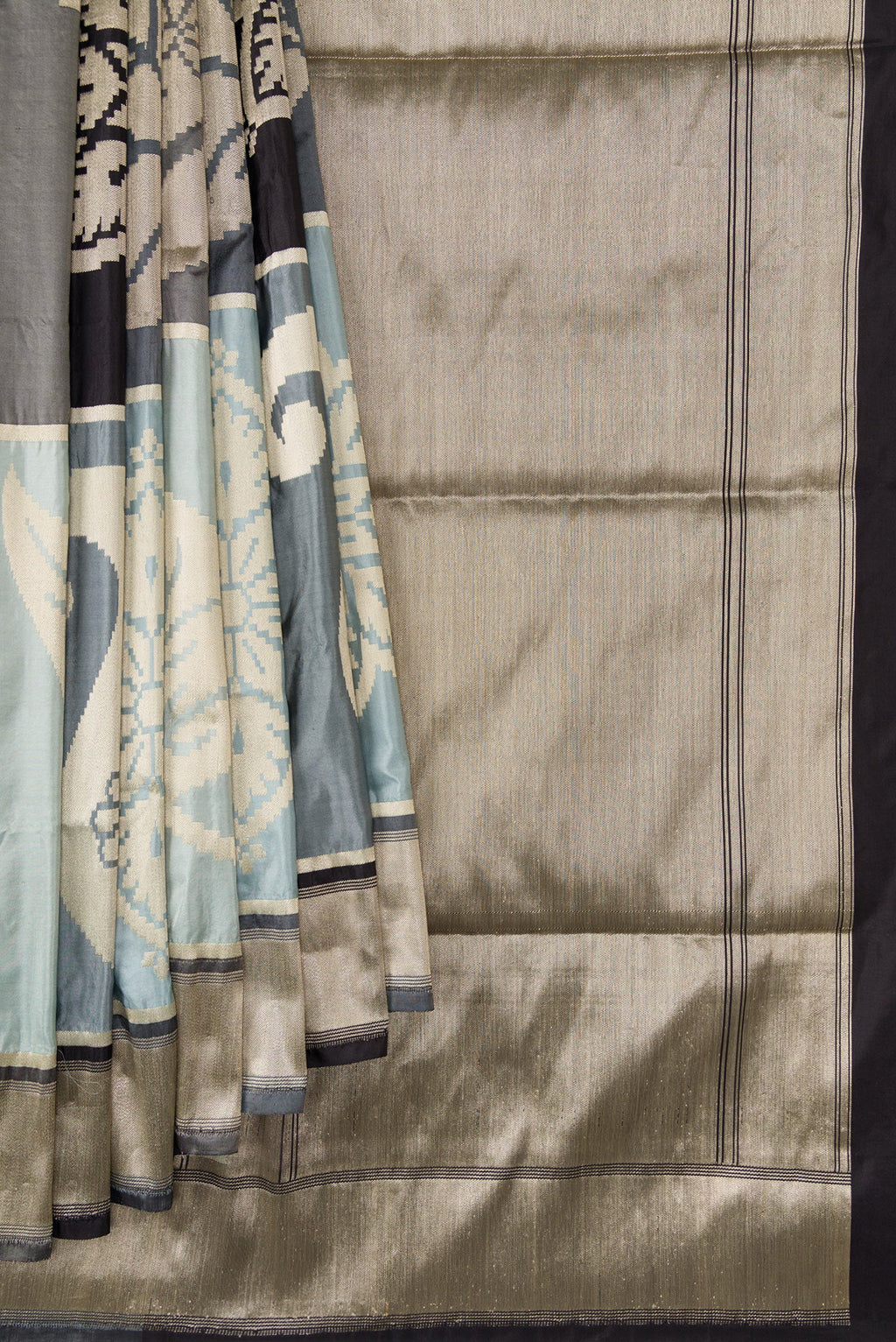 Pleats and pallu of Black, Grey and Off White Color Banarasi Silk Saree with Zari Brocade on the body and Zari Border. 