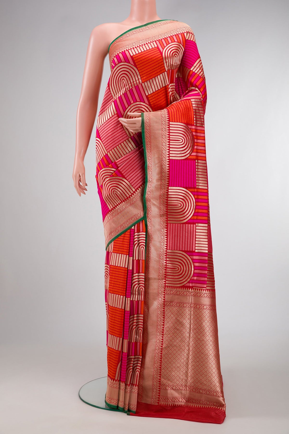 Red Dual Tone Banarasi Silk Saree with Zari Brocade on the body and Zari Border.  displayed on a mannequin
