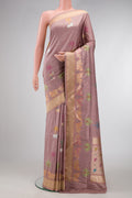 Rose Gold Dual Tone Banarasi Silk Saree with Zari And Thread Butta on the body and Fancy Border.  displayed on a mannequin