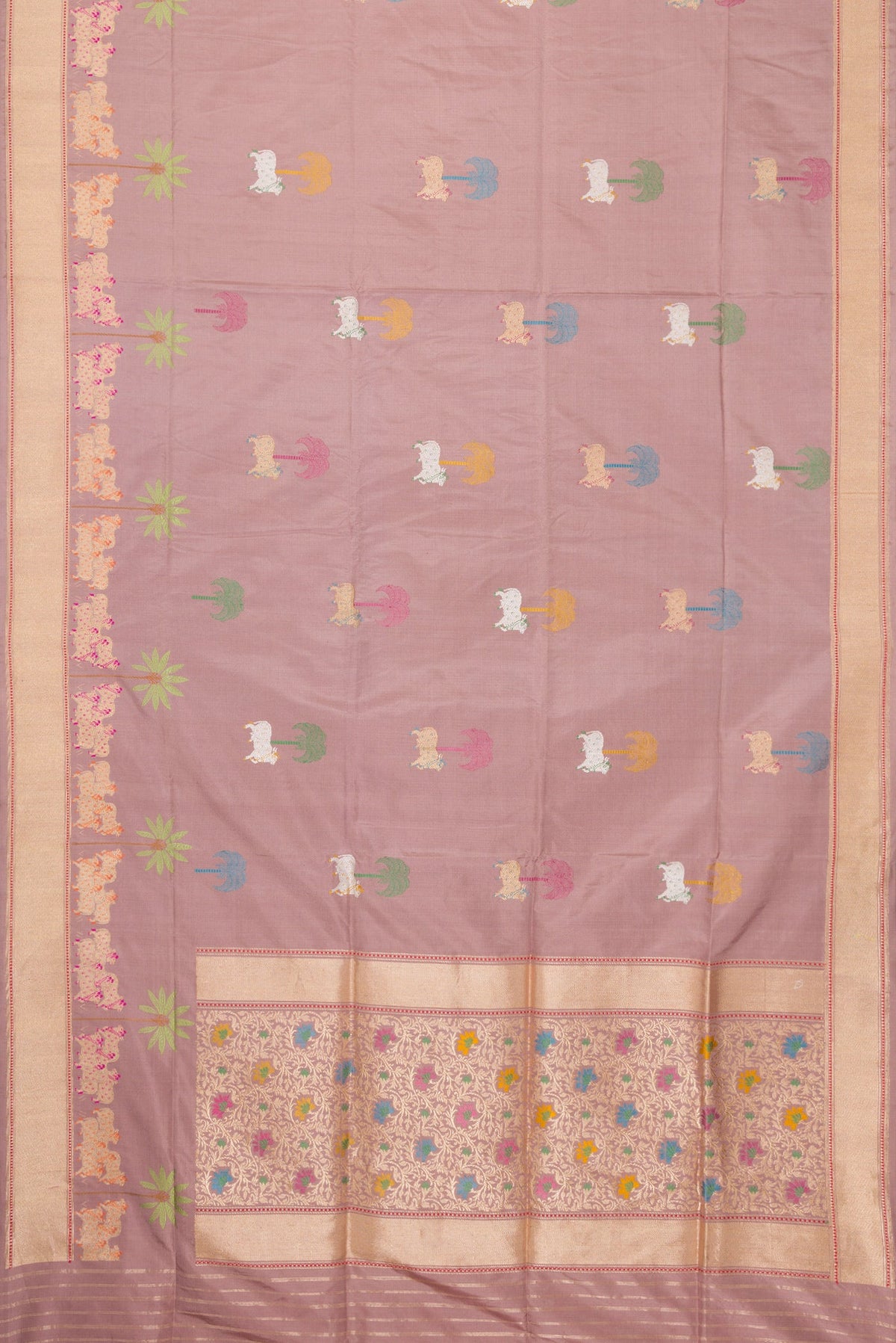 Flat view of Rose Gold Dual Tone Banarasi Silk Saree with Zari And Thread Butta on the body and Fancy Border. 
