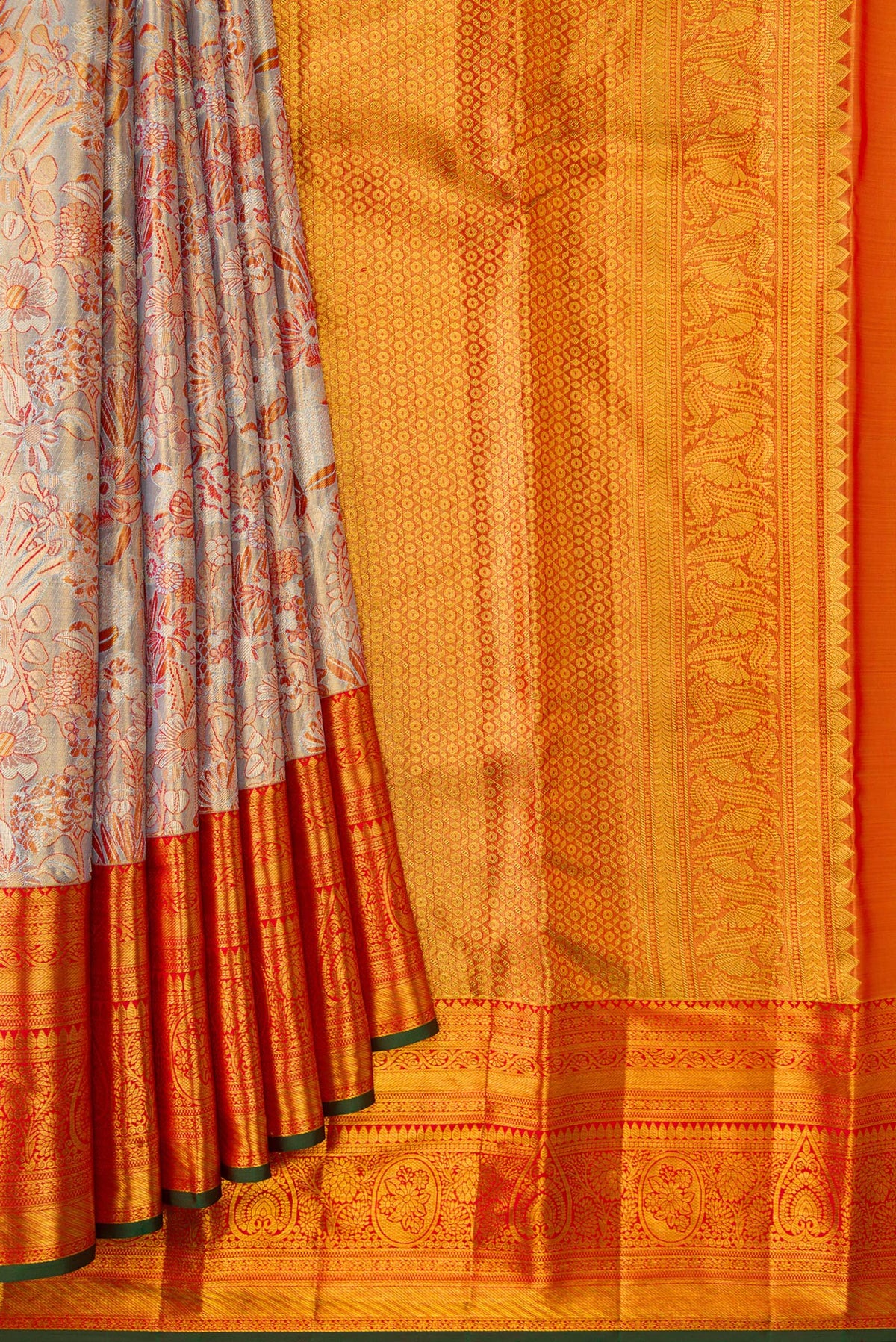Pleats and pallu of Lilac with Gold Color Kanjivaram Tissue Silk Saree with Zari Brocade on the body and Zari Border. 